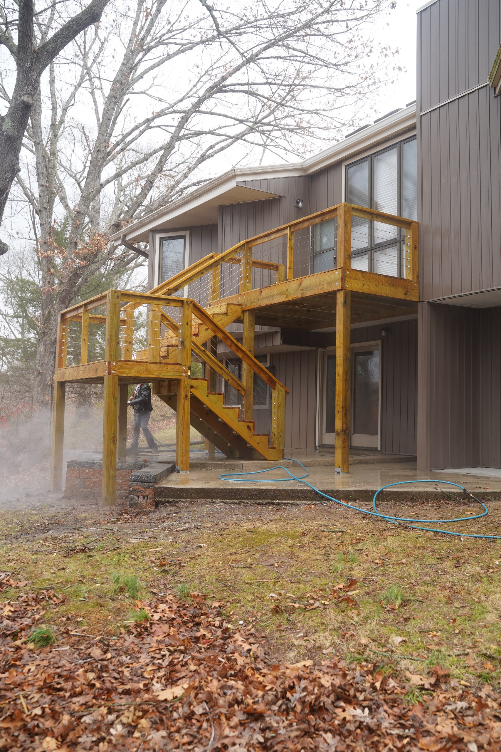 Weathered cedar deck before restoration — Springfield, MO