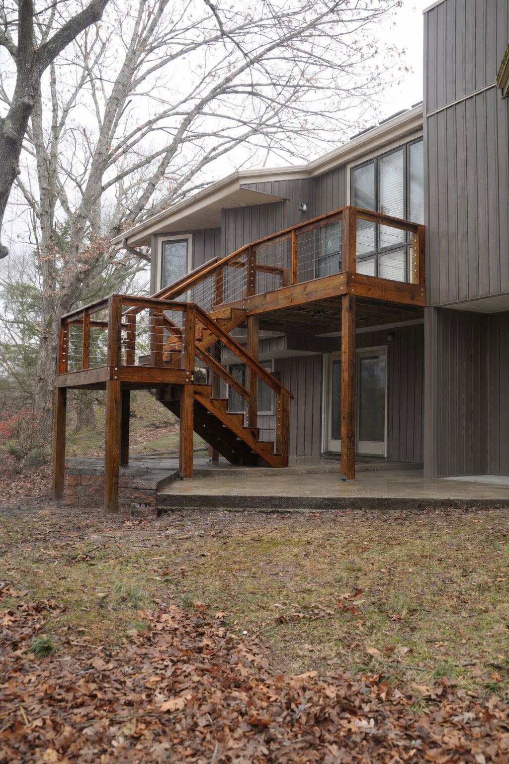 Cedar multi-level deck after Dark Walnut staining — Springfield MO by Stain and Seal Pros