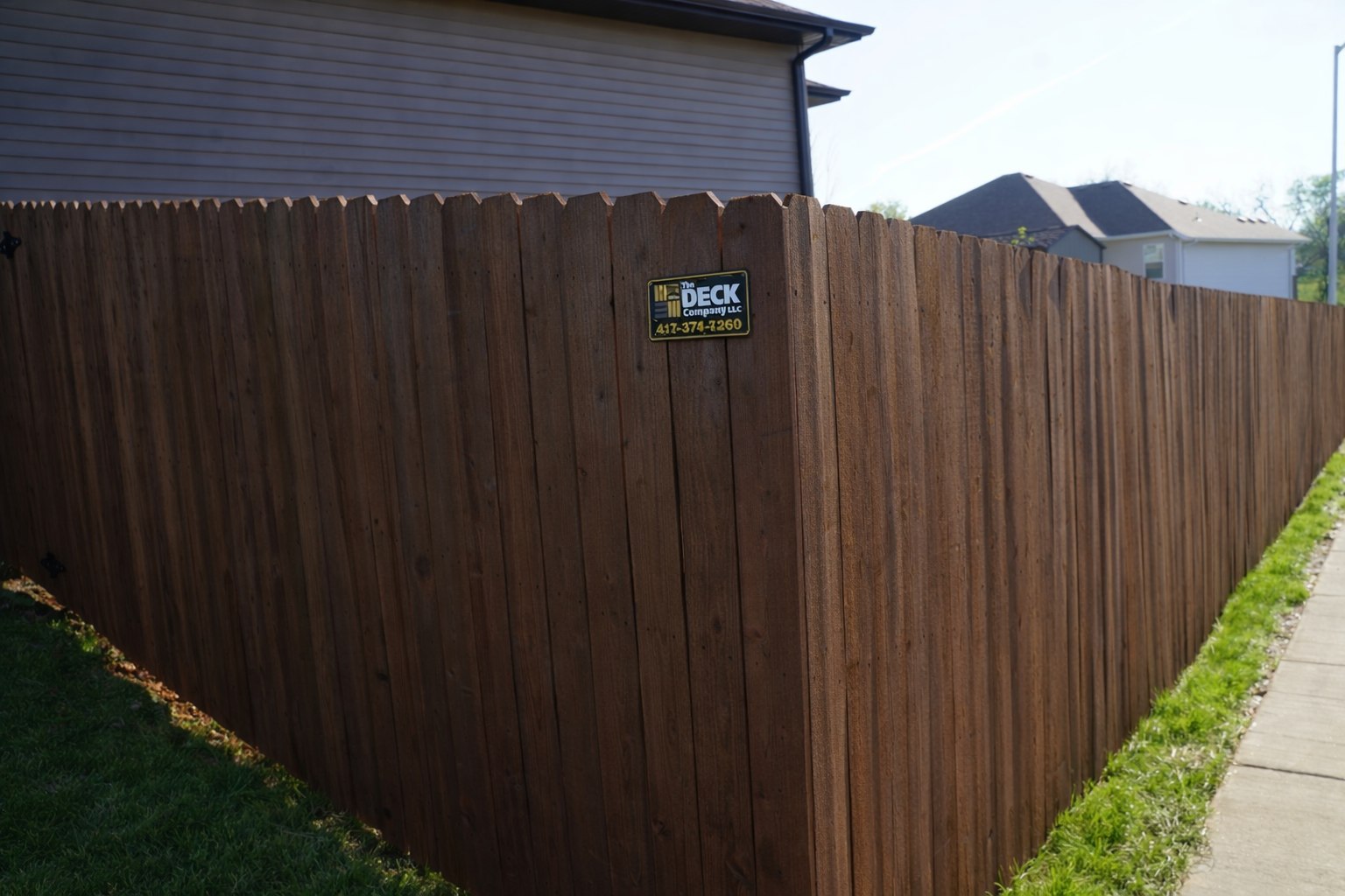 Professional wood fence staining and sealing in Springfield MO by Stain and Seal Pros