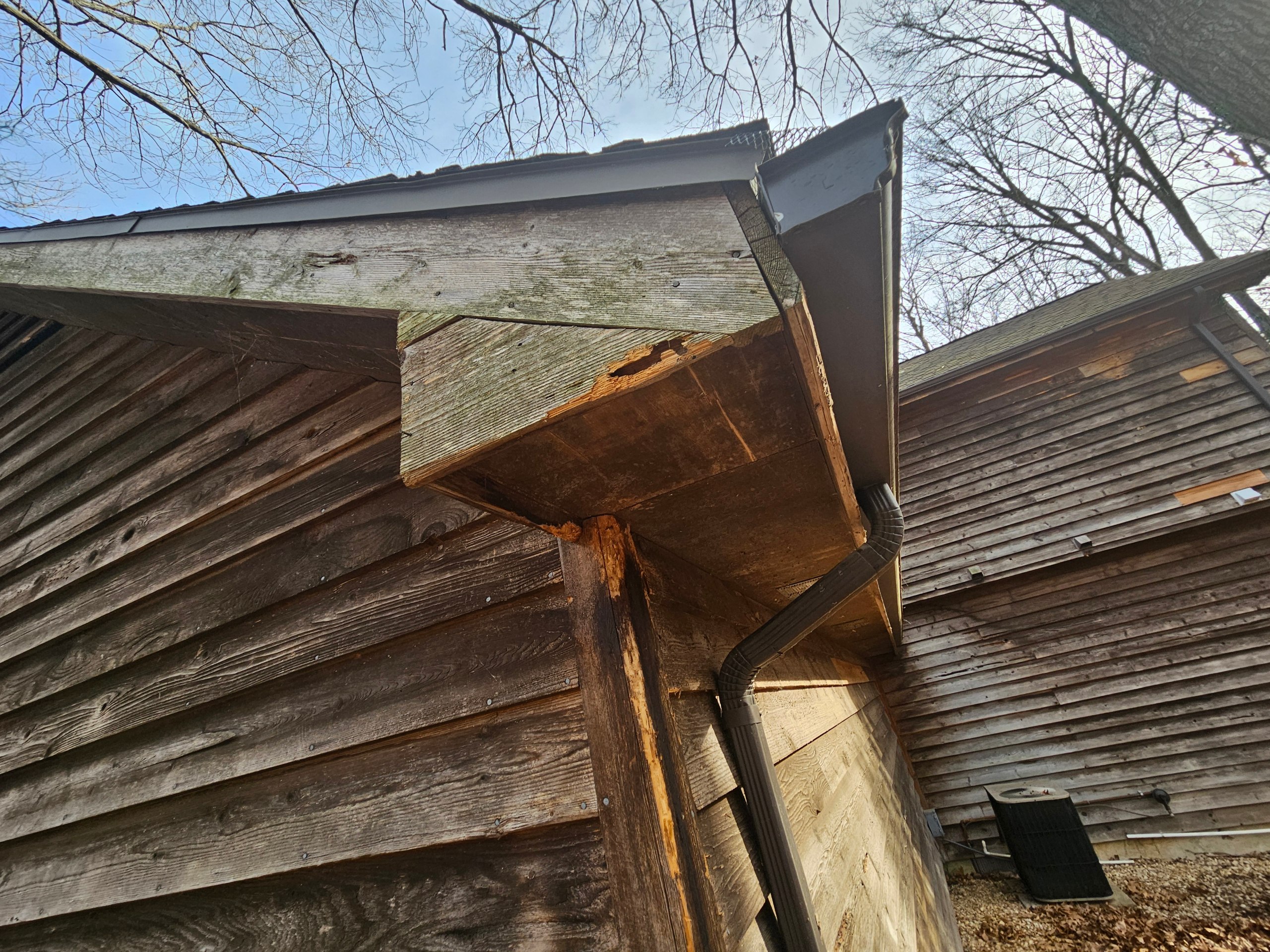 Wood rot and damage repair on weathered siding in Springfield MO by Stain and Seal Pros